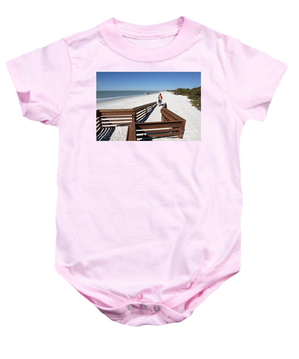 Beach Baby Onesie featuring the photograph Tide of Sand over a ramp on the beach in Naples Florida by William Kuta