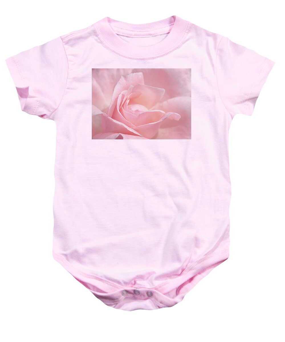 Rose Baby Onesie featuring the photograph A Delicate Pink Rose by Susan Rissi Tregoning