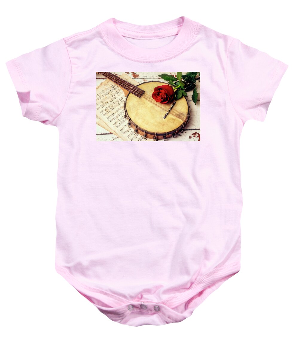 Mandolin Banjo Baby Onesie featuring the photograph Banjo And Red Rose by Garry Gay