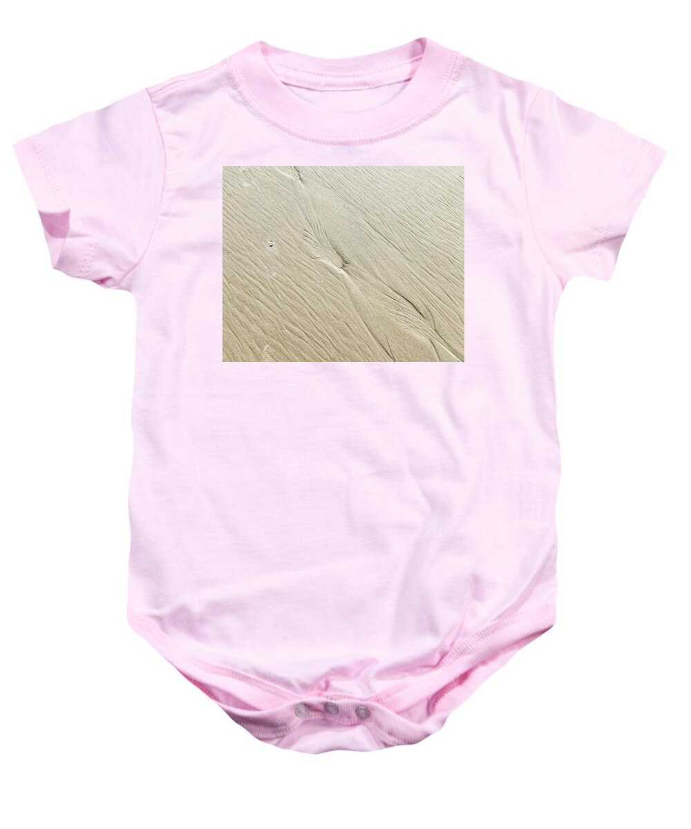 Sand Baby Onesie featuring the photograph Go with the Flow by Portia Olaughlin