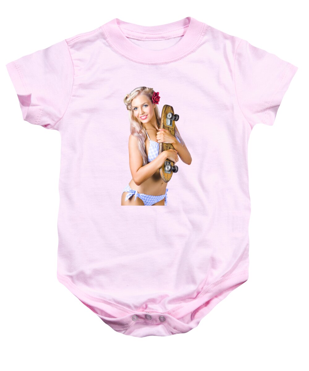 Skate Baby Onesie featuring the photograph Pinup woman in bikini holding skateboard by Jorgo Photography