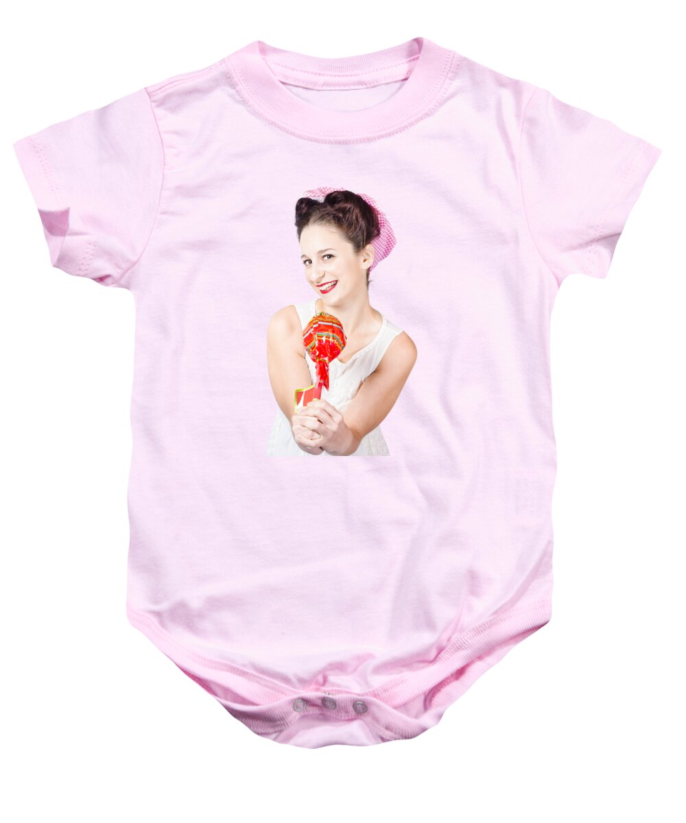 Confectionery Baby Onesie featuring the photograph Sweet lolly shop lady offering over red lollipop by Jorgo Photography