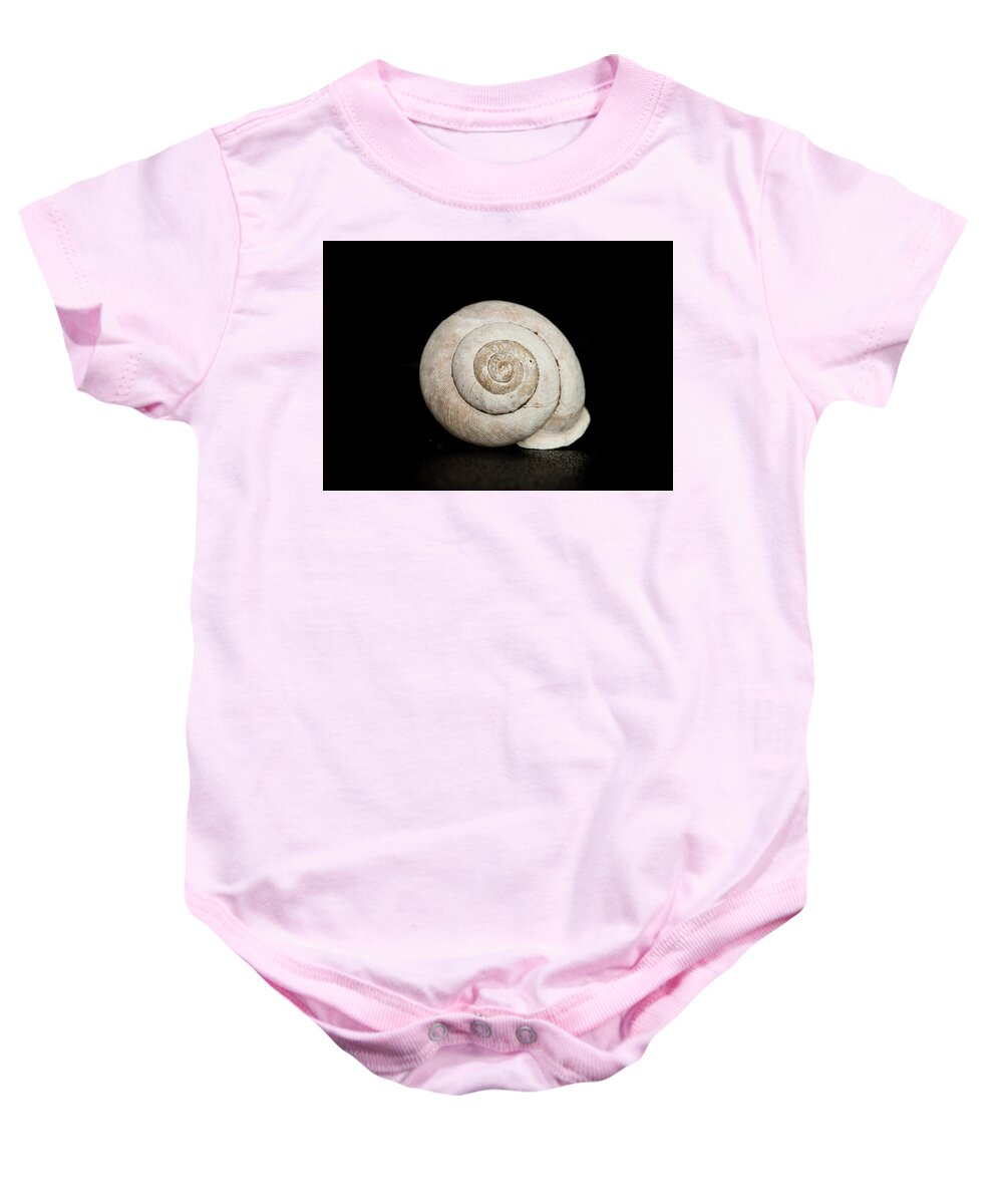 Black Baby Onesie featuring the photograph Spiral Shell by Amelia Pearn