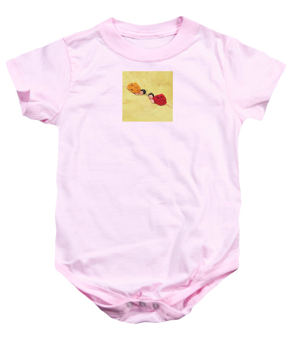 Ladybug Baby Onesie featuring the photograph Tiny Ladybugs by Anne Geddes