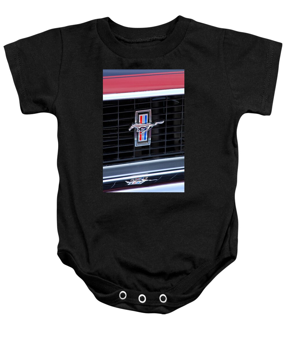1969 Ford Mustang Mach 1 Baby Onesie featuring the photograph 1969 Mustang Mach 1 Grille Emblem by Jill Reger