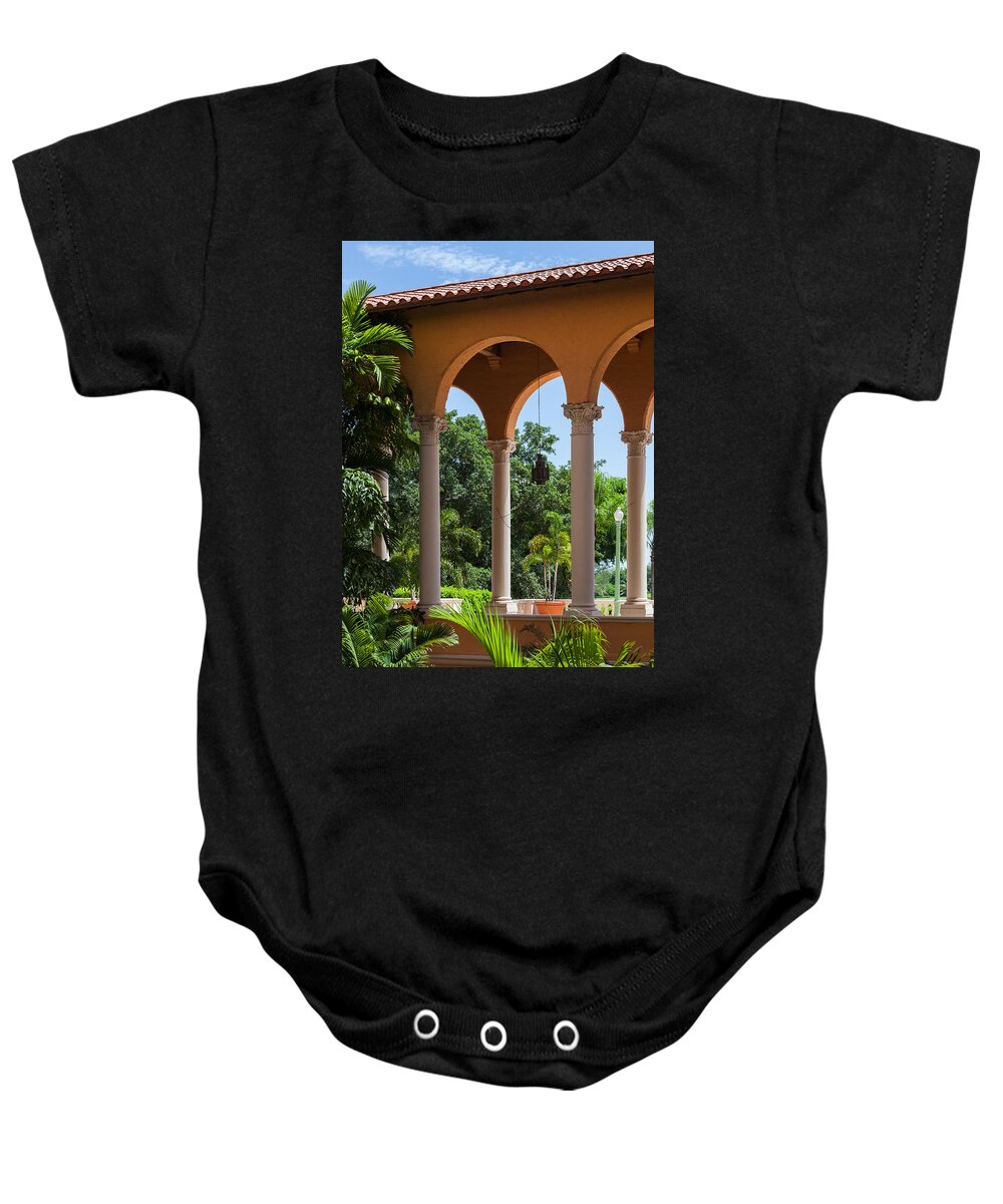 Arches Baby Onesie featuring the photograph A Covered Walkway at the Biltmore by Ed Gleichman
