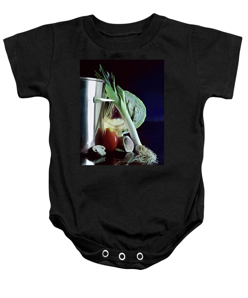Still Life Baby Onesie featuring the photograph A Pot With Assorted Vegetables by Fotiades