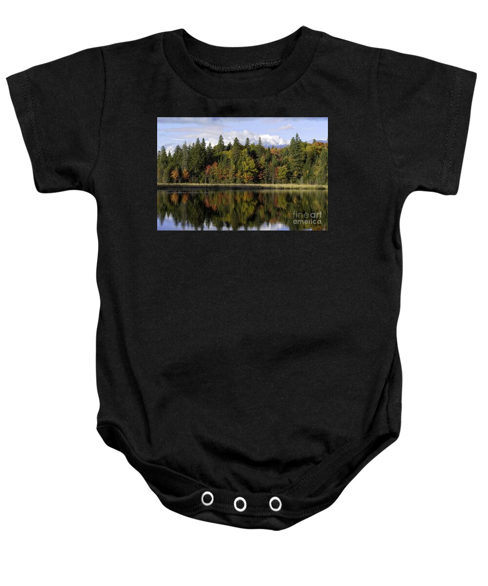 Algonquin Baby Onesie featuring the photograph Colorful trees reflected in a lake by Les Palenik