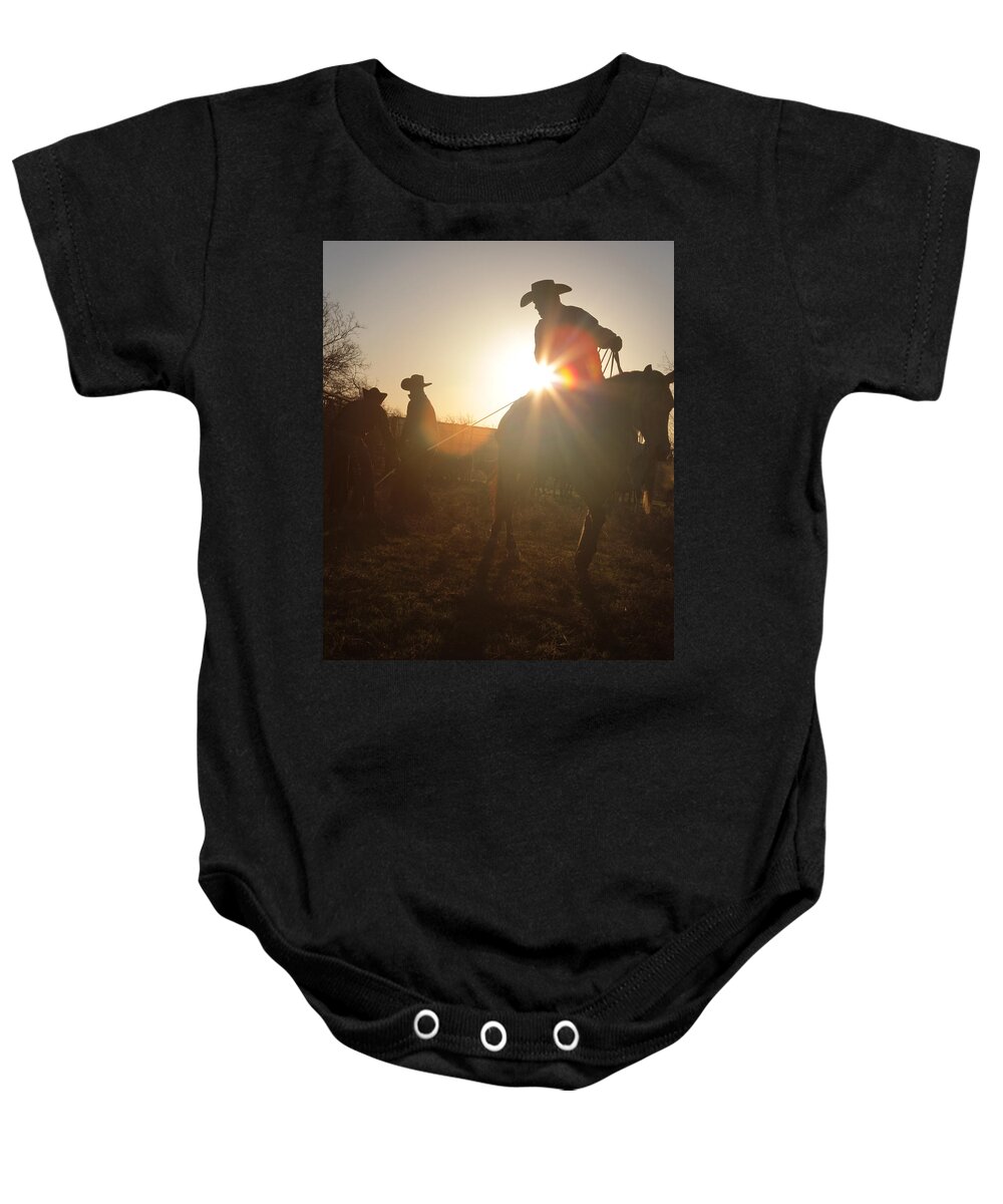 Texas Cowboys Baby Onesie featuring the photograph Daybreak by Diane Bohna