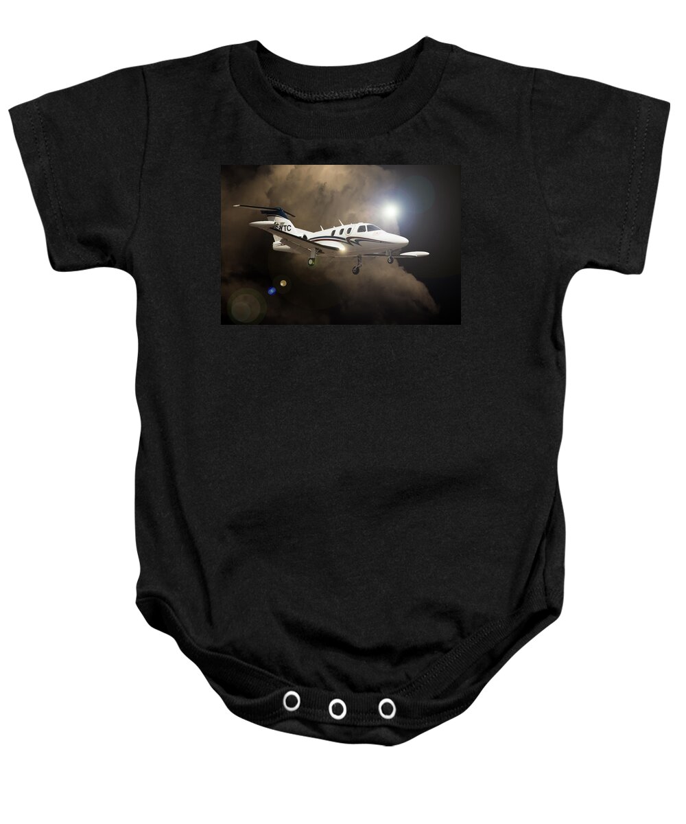 Eclipse Aerospace Baby Onesie featuring the photograph Eclipse Landing by Paul Job