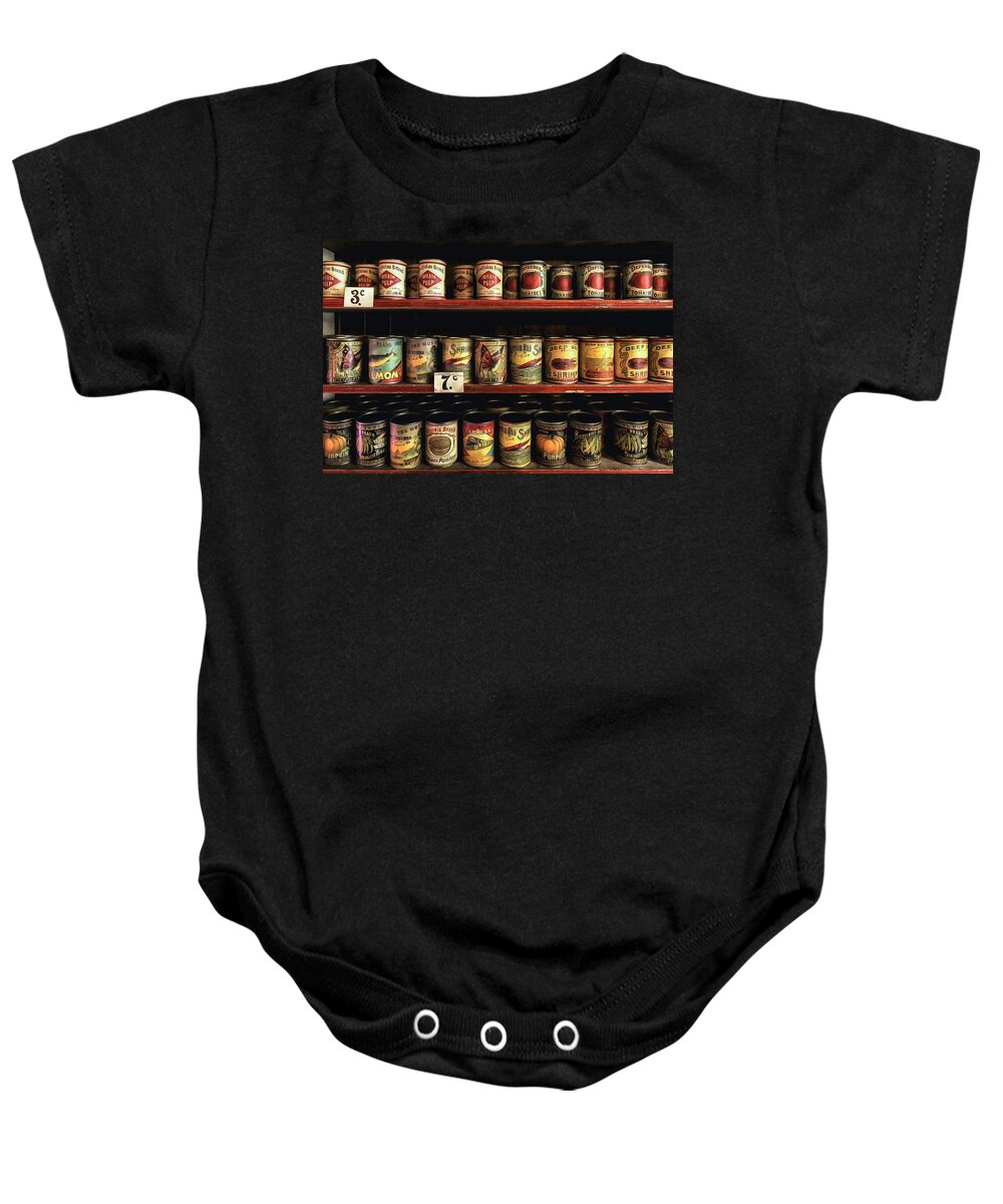 Tin Baby Onesie featuring the photograph General Store 1 by Nigel R Bell