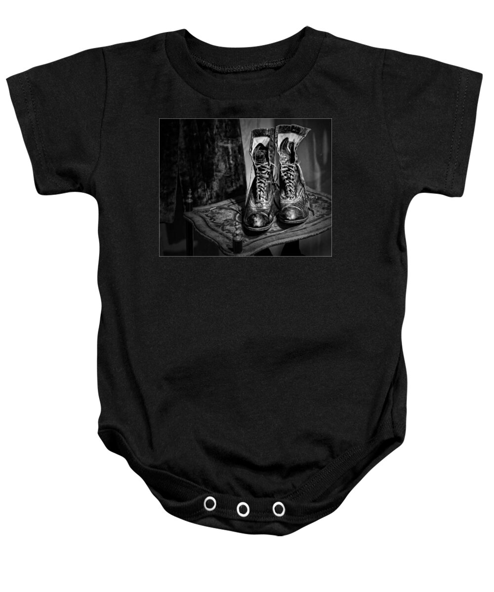 Boots Baby Onesie featuring the photograph High Top Shoes - bw by Nikolyn McDonald