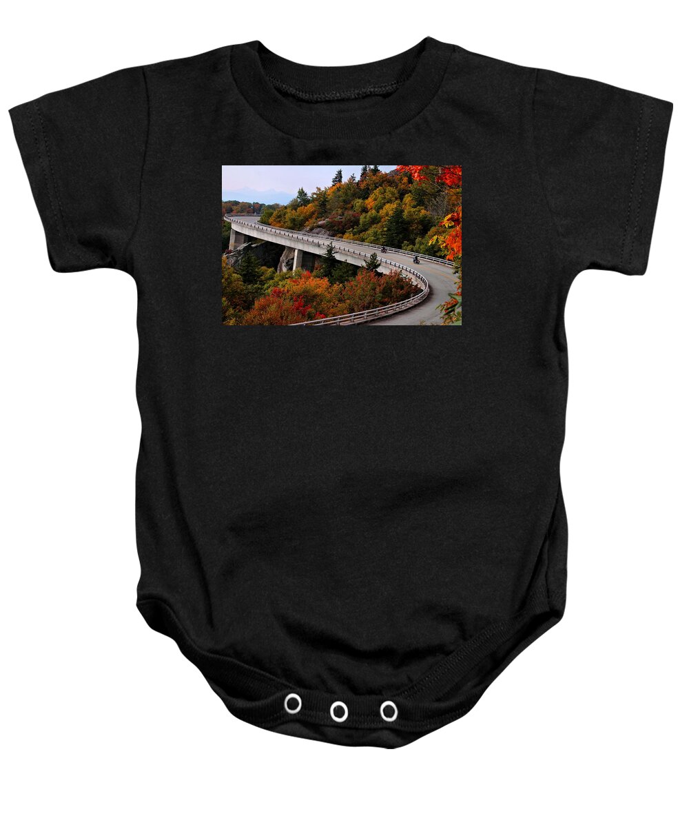 Linn Cove Viaduct Baby Onesie featuring the photograph Lean In For A Ride by Carol Montoya