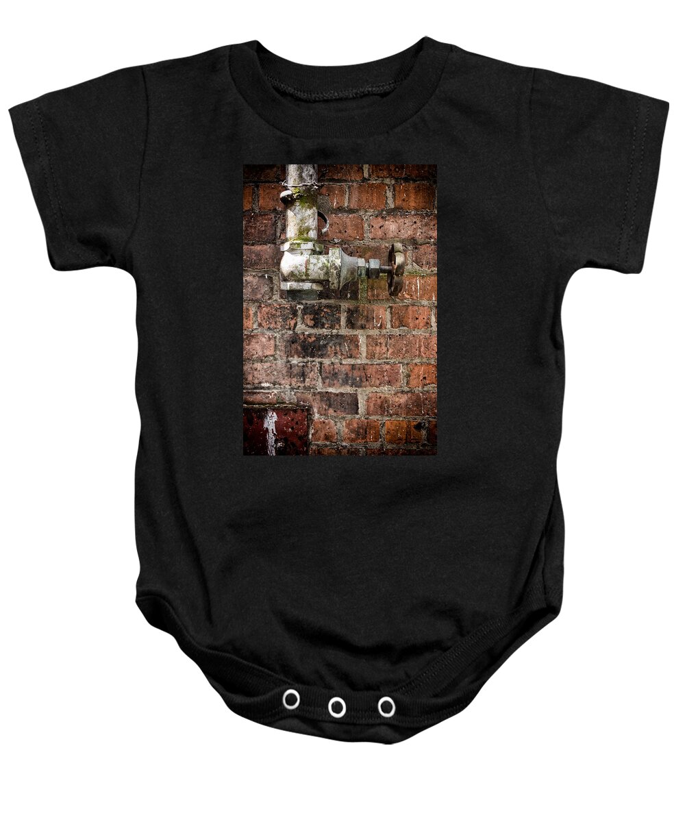 Urban Baby Onesie featuring the photograph Old valve by Nigel R Bell