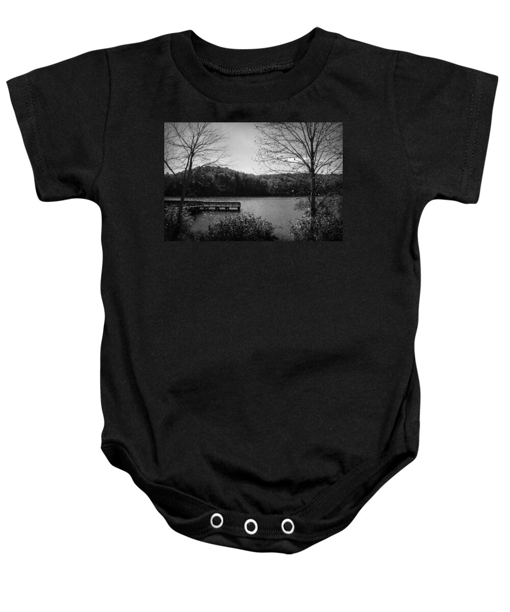 Kelly Hazel Baby Onesie featuring the photograph Pier at Table Rock in Black and White by Kelly Hazel