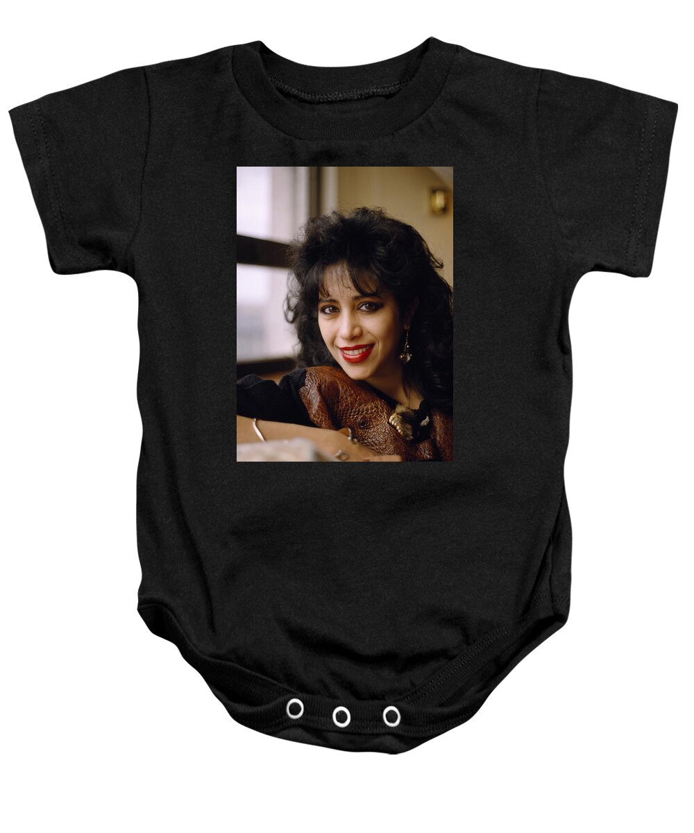 Ofra Haza Baby Onesie featuring the photograph Portrait Of Ofra Haza by Shaun Higson