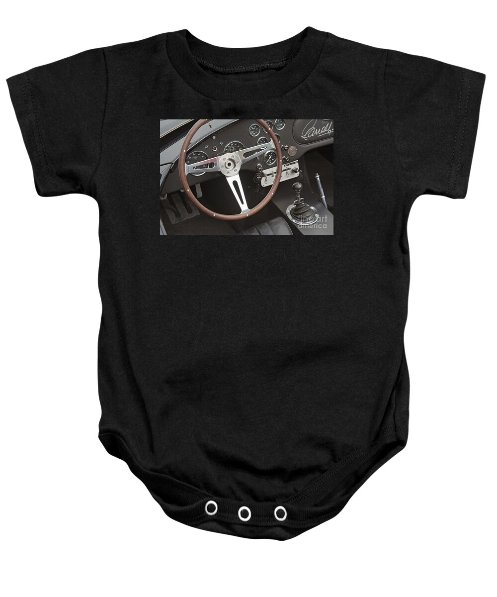 Shelby Motors Baby Onesie featuring the photograph Shelby Motors Roadster signed by Carroll Shelby by David Zanzinger