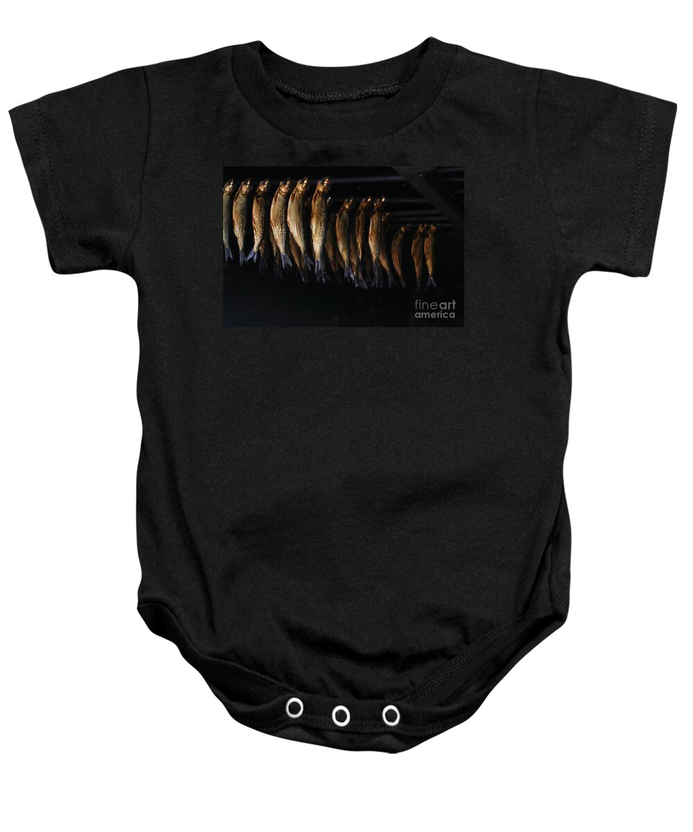 Drying Baby Onesie featuring the photograph Smoking fish by Patricia Hofmeester