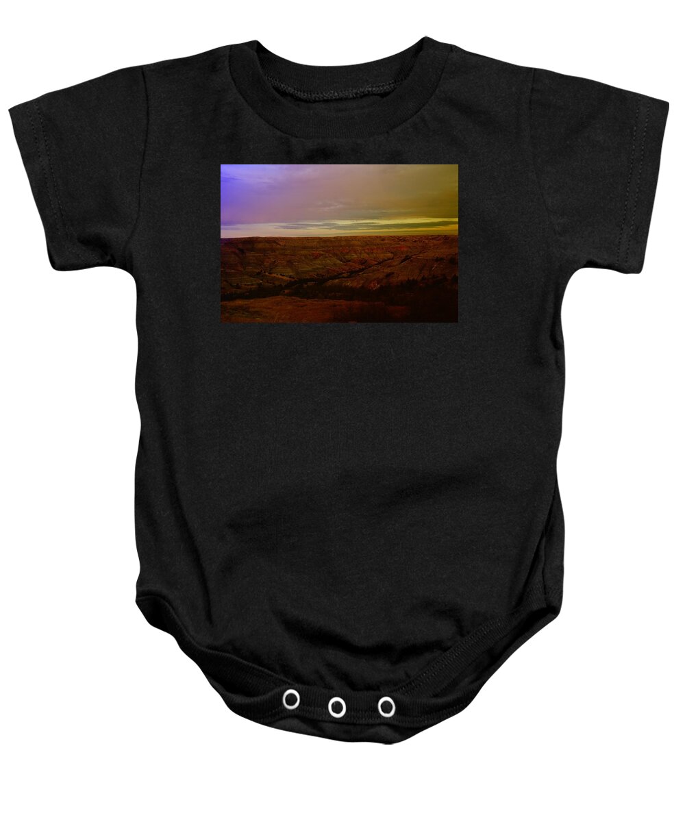 Badlands Baby Onesie featuring the photograph The Badlands by Jeff Swan
