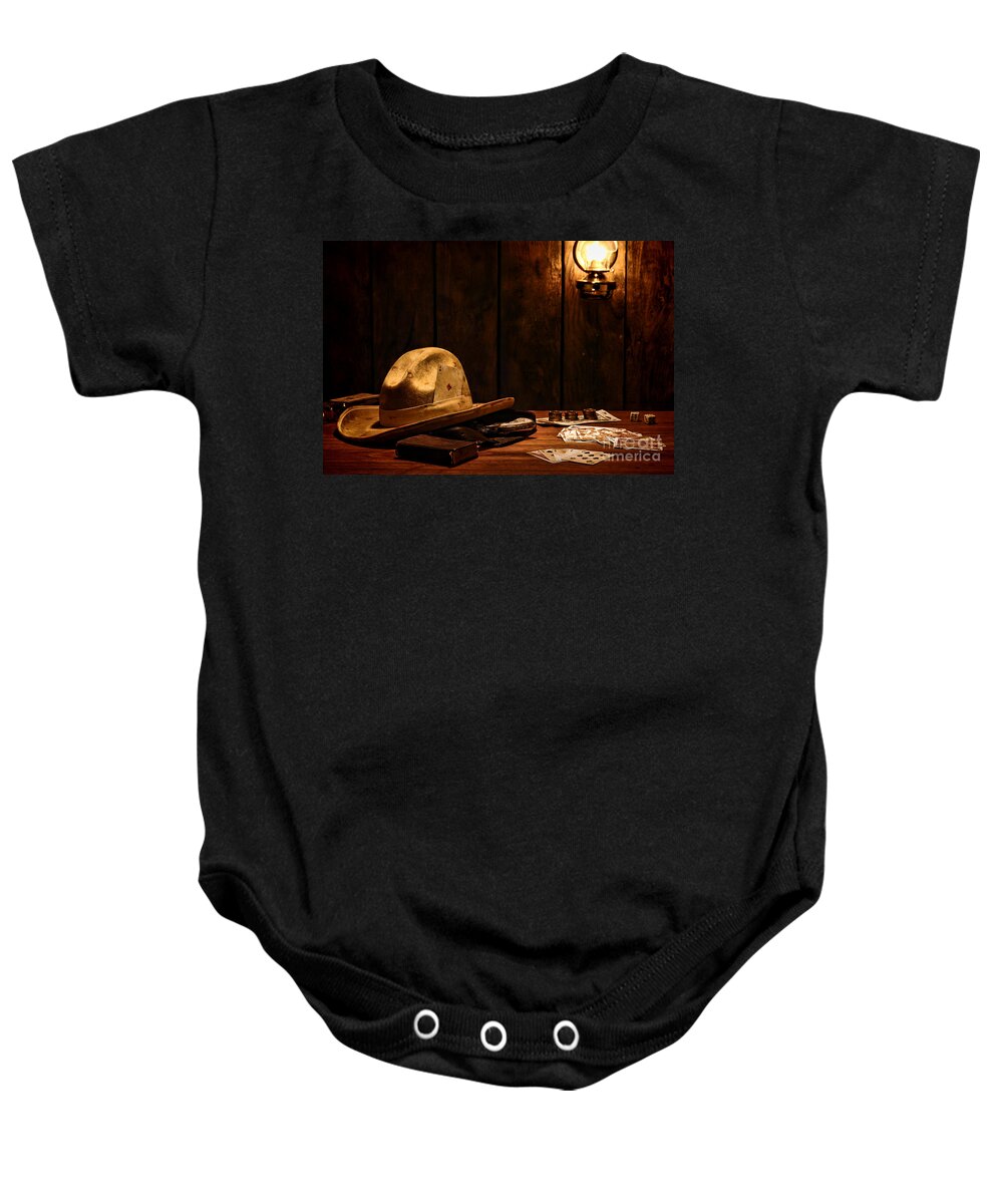 Cowboy Baby Onesie featuring the photograph The Gambler by Olivier Le Queinec