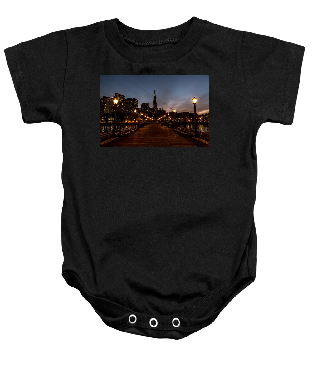 John Daly Baby Onesie featuring the photograph Transamerica Pyramid Pier Night by John Daly