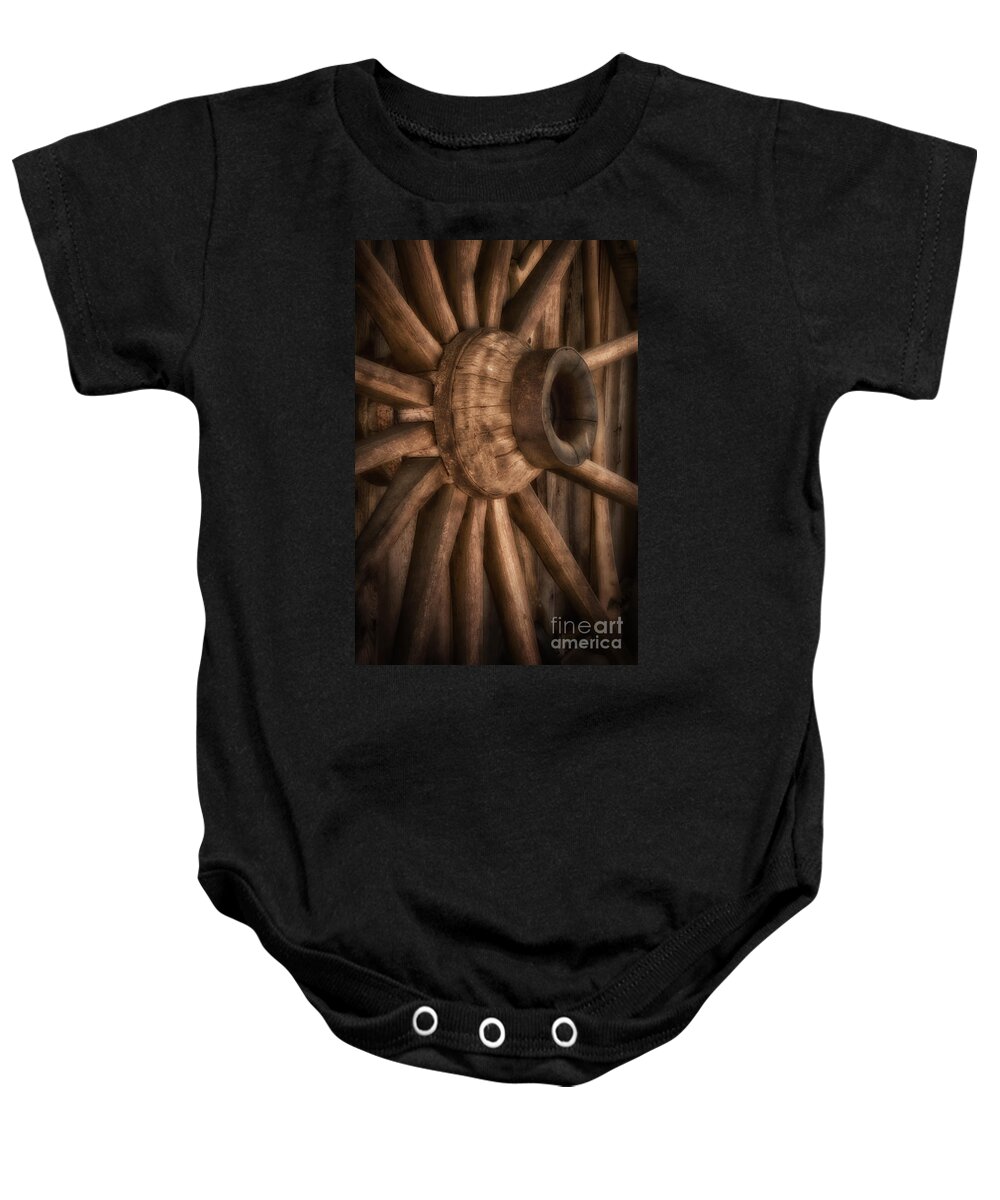 Wagon Wheel Baby Onesie featuring the photograph Wagon Wheel by Carrie Cranwill
