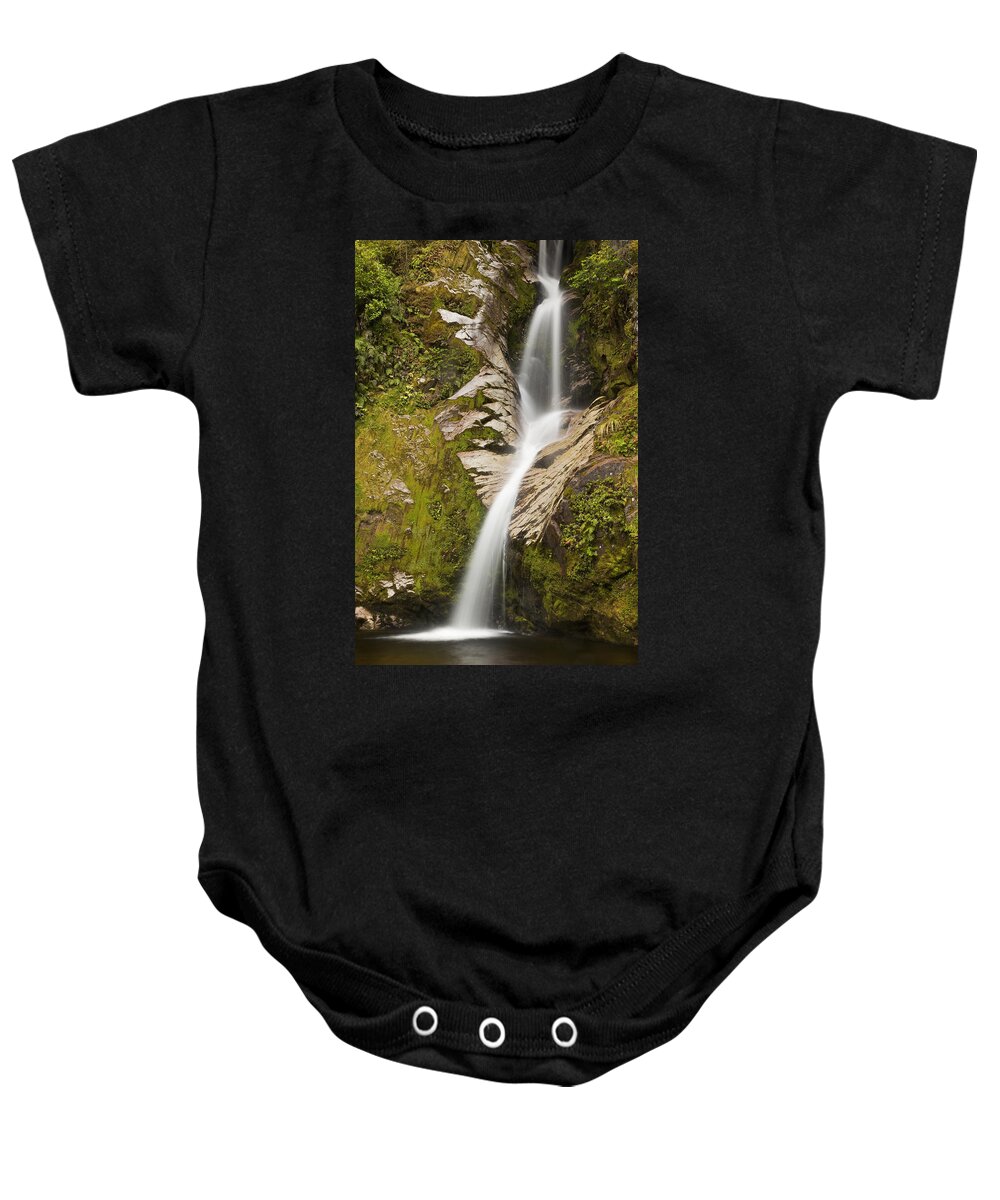 00439764 Baby Onesie featuring the photograph Dorothy Falls Near Lake Kaniere New #1 by Colin Monteath