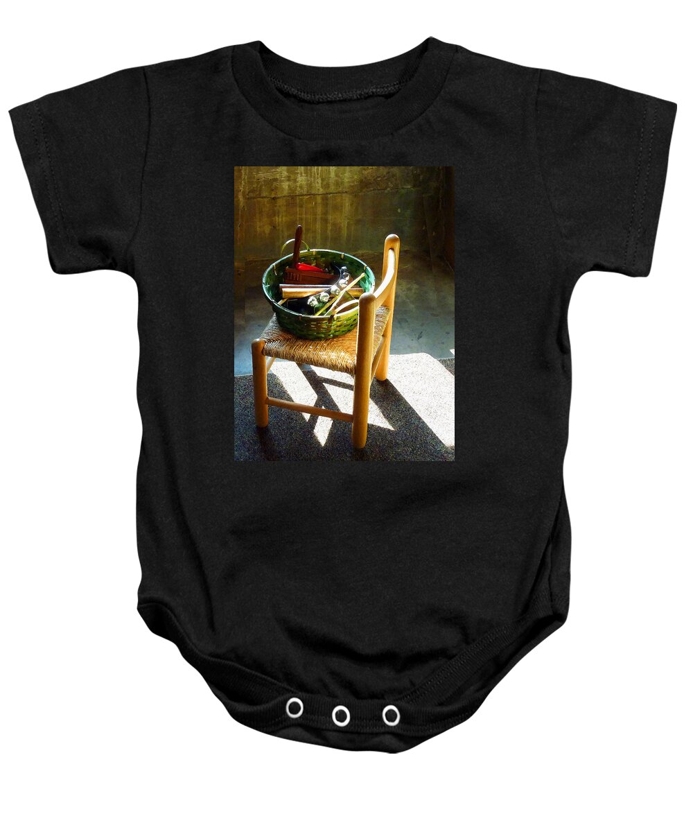 Bells Baby Onesie featuring the photograph Basket of Toy Instruments by Susan Savad