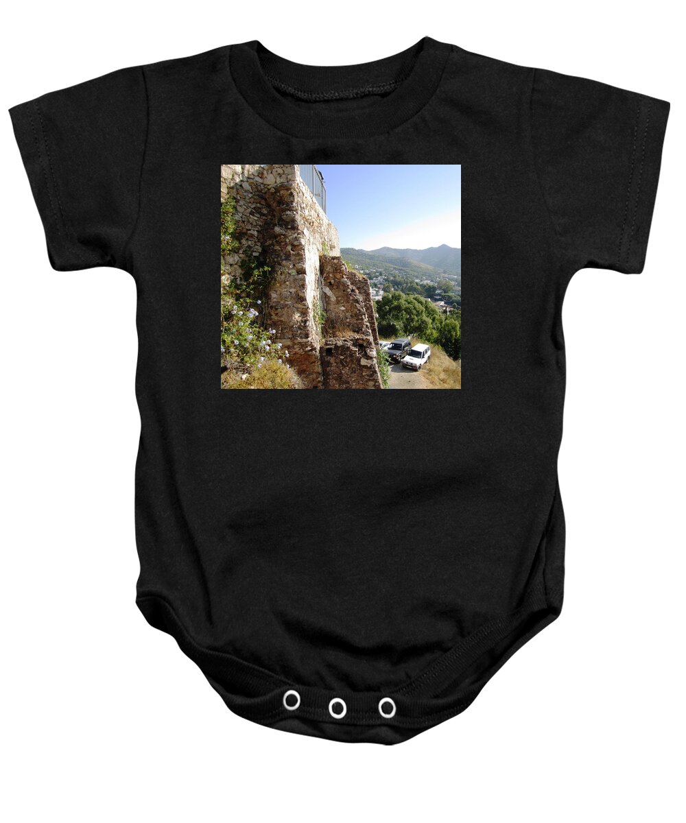 Rock Baby Onesie featuring the photograph Built Solid Rock Hilltop in Mijas Spain by John Shiron
