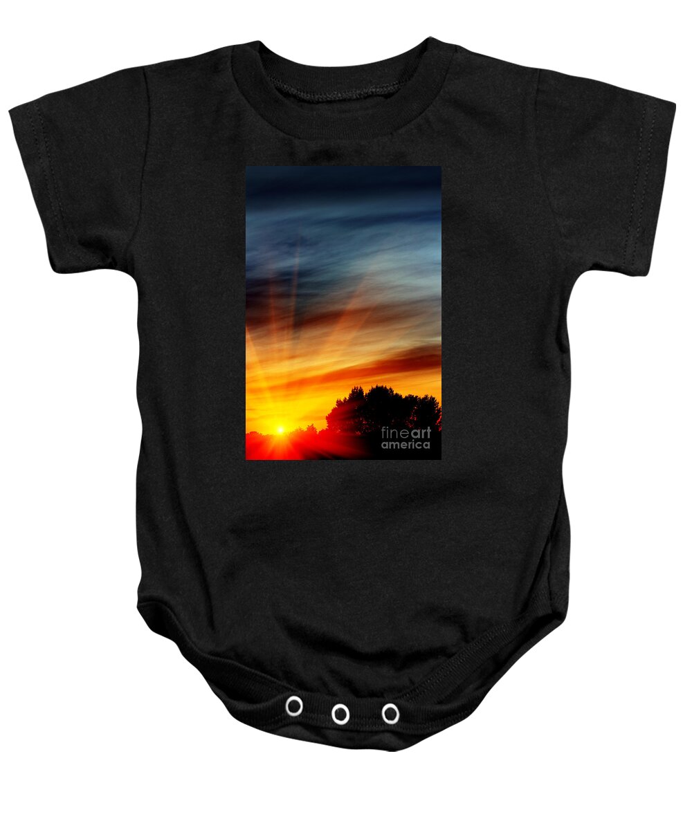 Sunset Baby Onesie featuring the photograph Fiery sunset in the evening by Simon Bratt