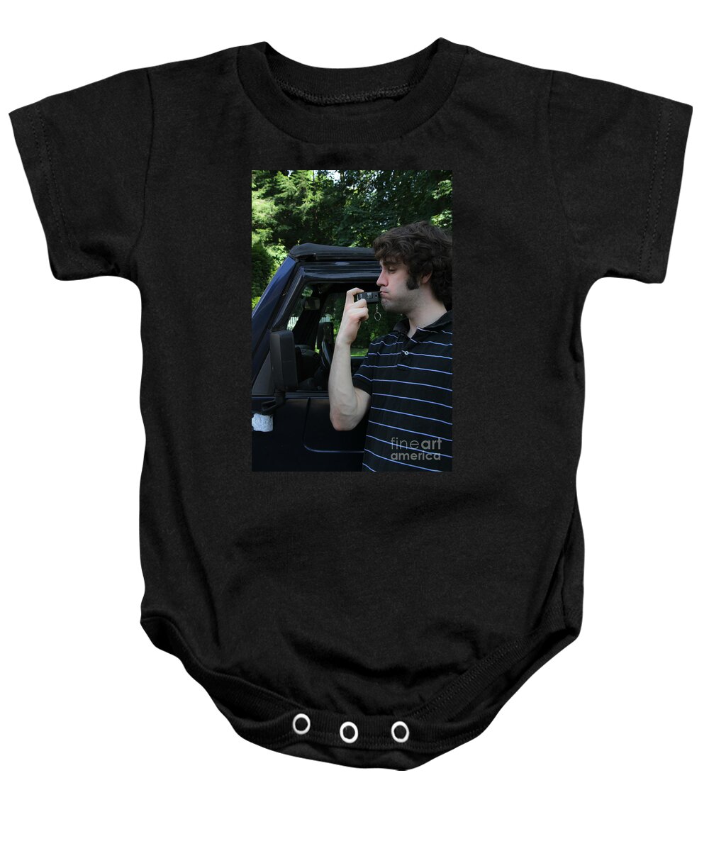 Alcohol Baby Onesie featuring the photograph Man Using A Breathalyzer by Photo Researchers, Inc.