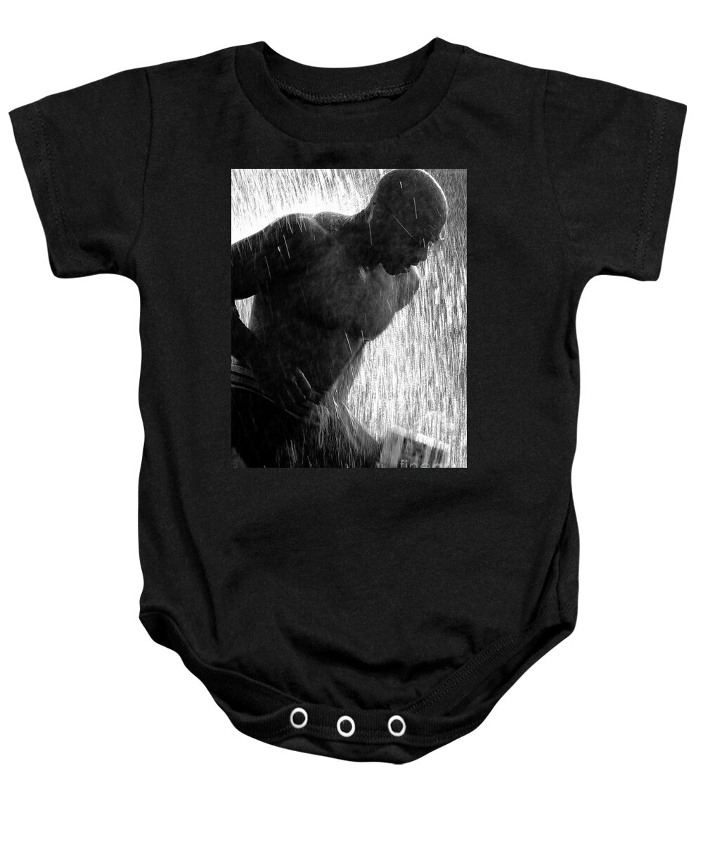 Road Race Baby Onesie featuring the photograph Runner in the Spray by Kathleen K Parker