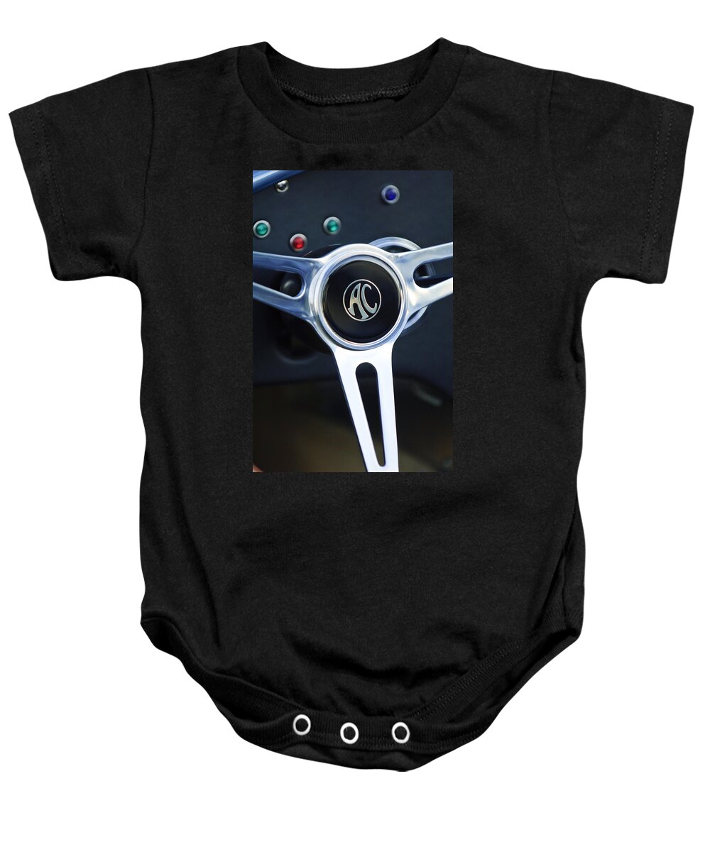 Shelby Ac Cobra Baby Onesie featuring the photograph Shelby AC Cobra Steering Wheel 4 by Jill Reger