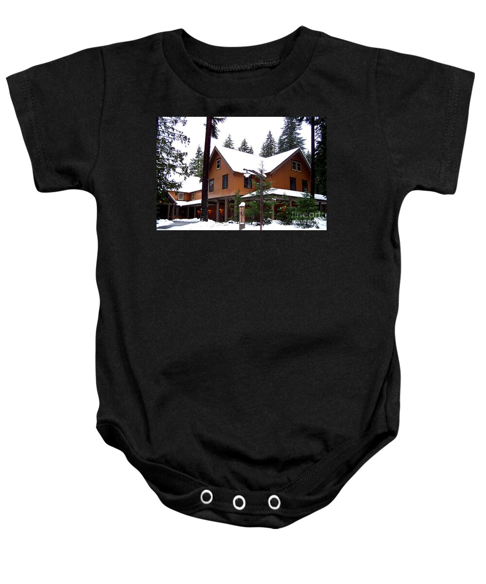 Snow Baby Onesie featuring the photograph Snow Atop the Inn at Longmire by Kathy White