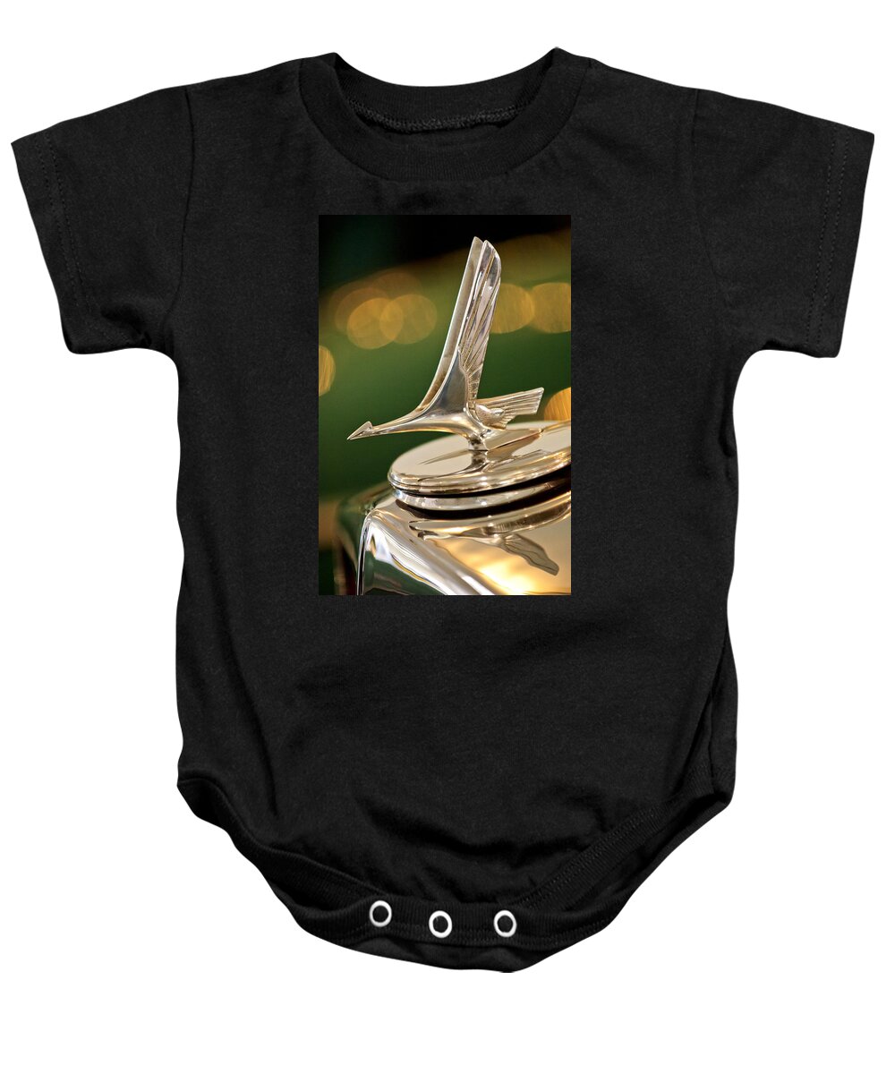 1932 Studebaker Dictator Custom Coupe Baby Onesie featuring the photograph 1932 Studebaker Dictator Custom Coupe Hood Ornament by Jill Reger