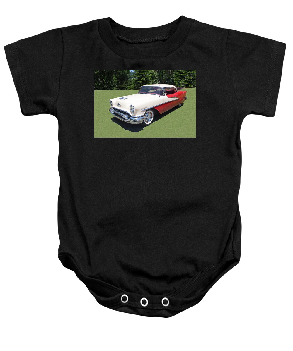 Antique Car Baby Onesie featuring the photograph 1955 Oldsmobile Super 88 Holiday by Carlos Diaz
