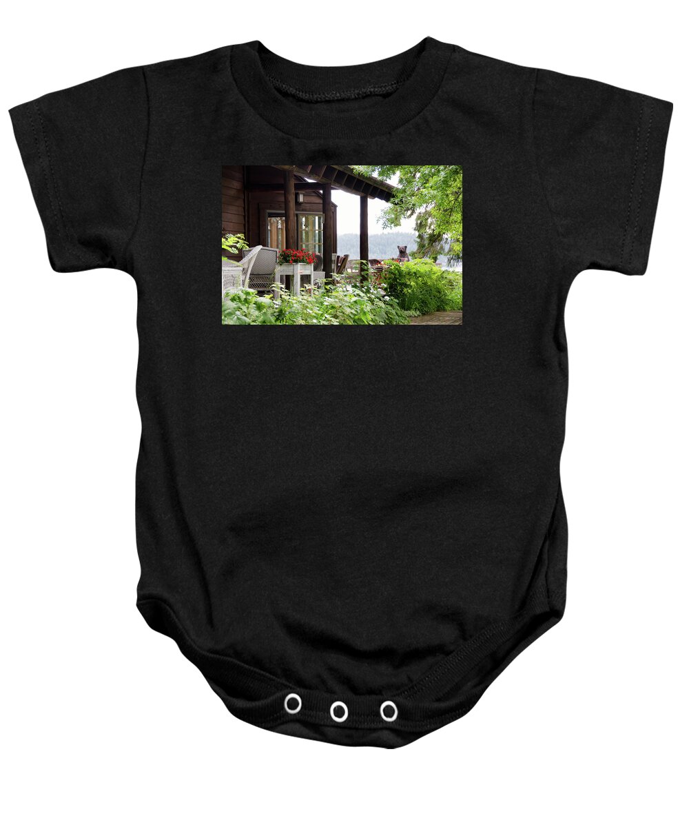 Bear Baby Onesie featuring the photograph A carved bear by Debra Baldwin