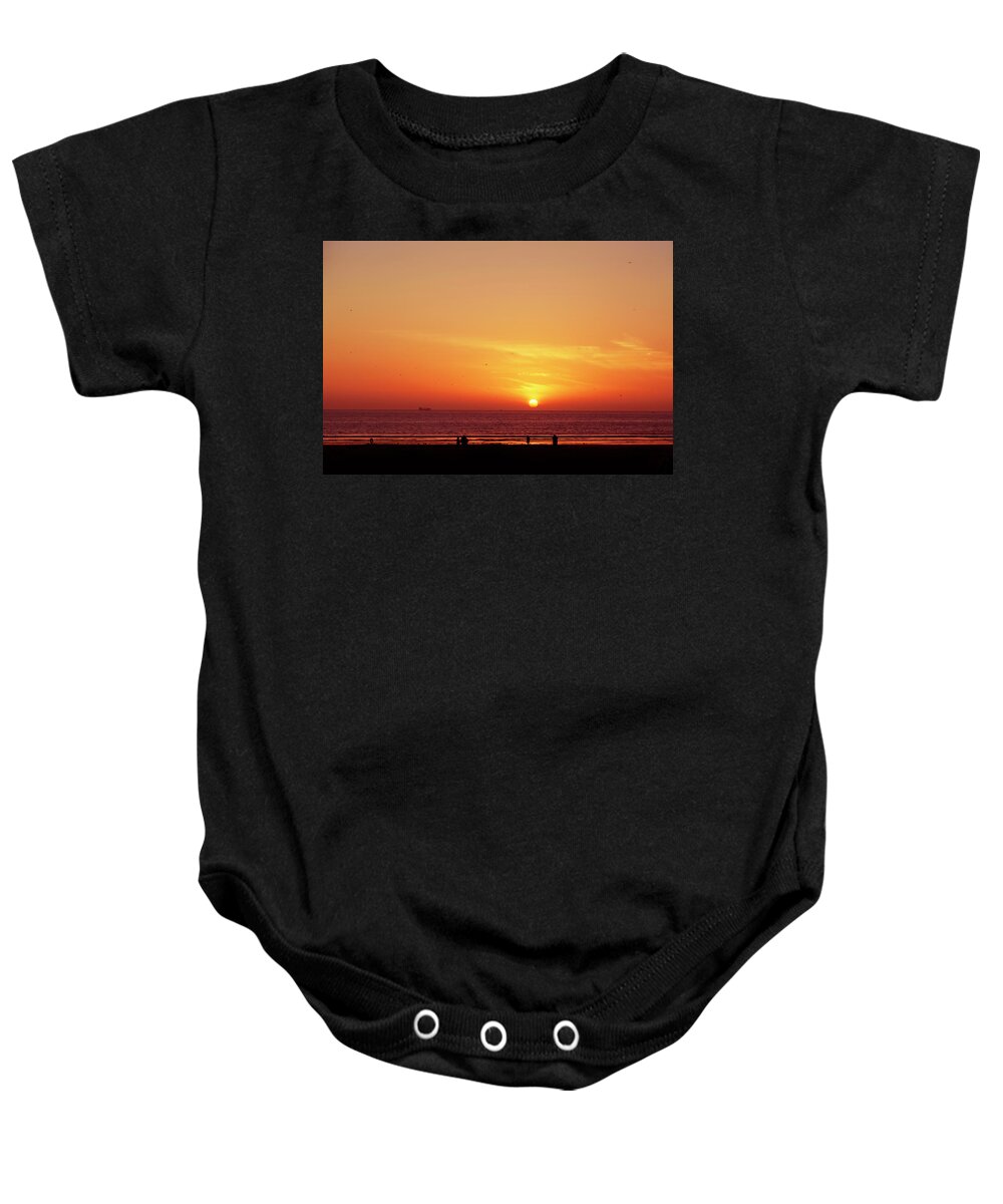 Africa Baby Onesie featuring the photograph A gorgeous sundown with view to the sea by Gina Koch