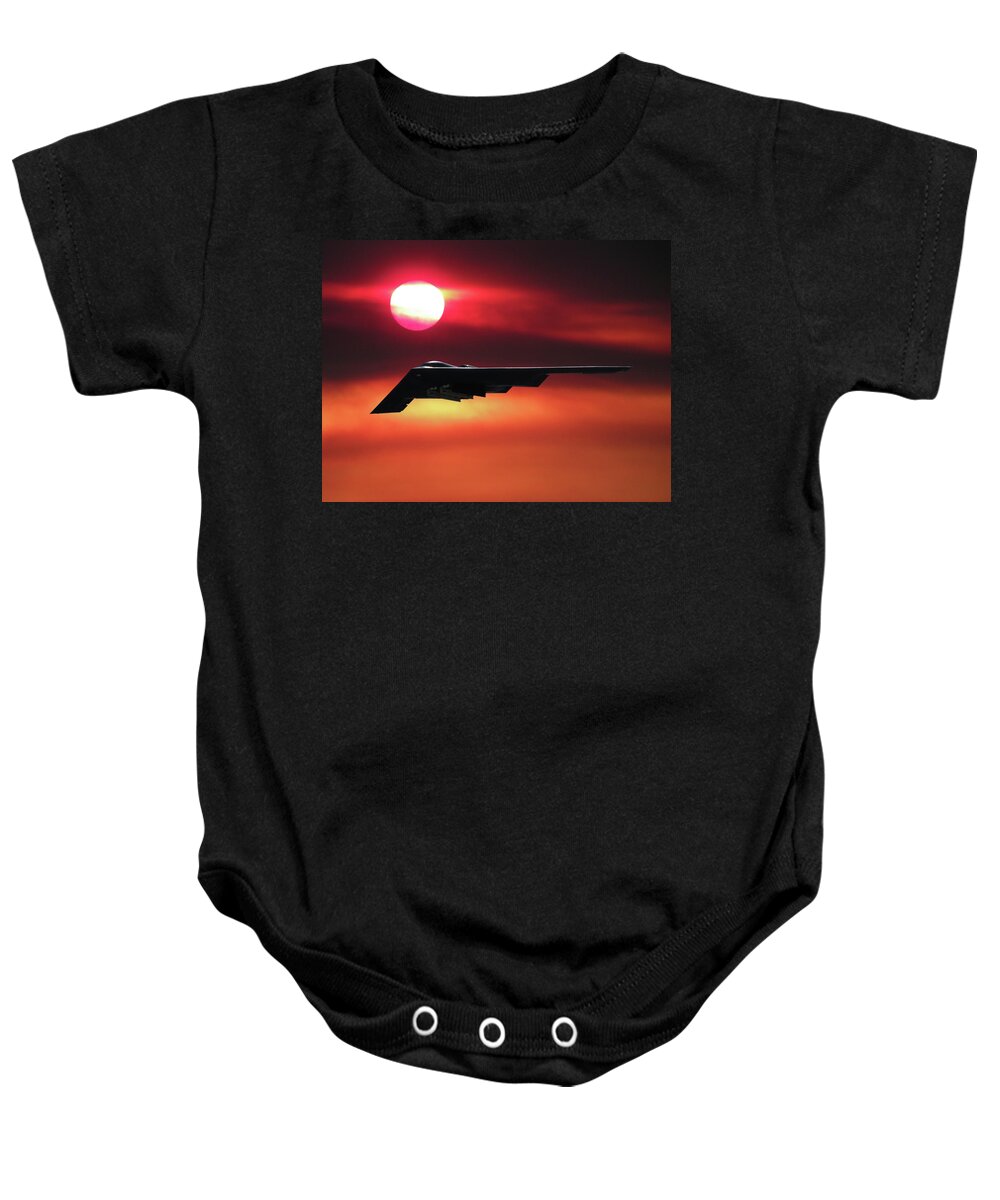 B-2 Stealth Bomber Baby Onesie featuring the mixed media B-2 Stealth Bomber in the Sunset by Erik Simonsen