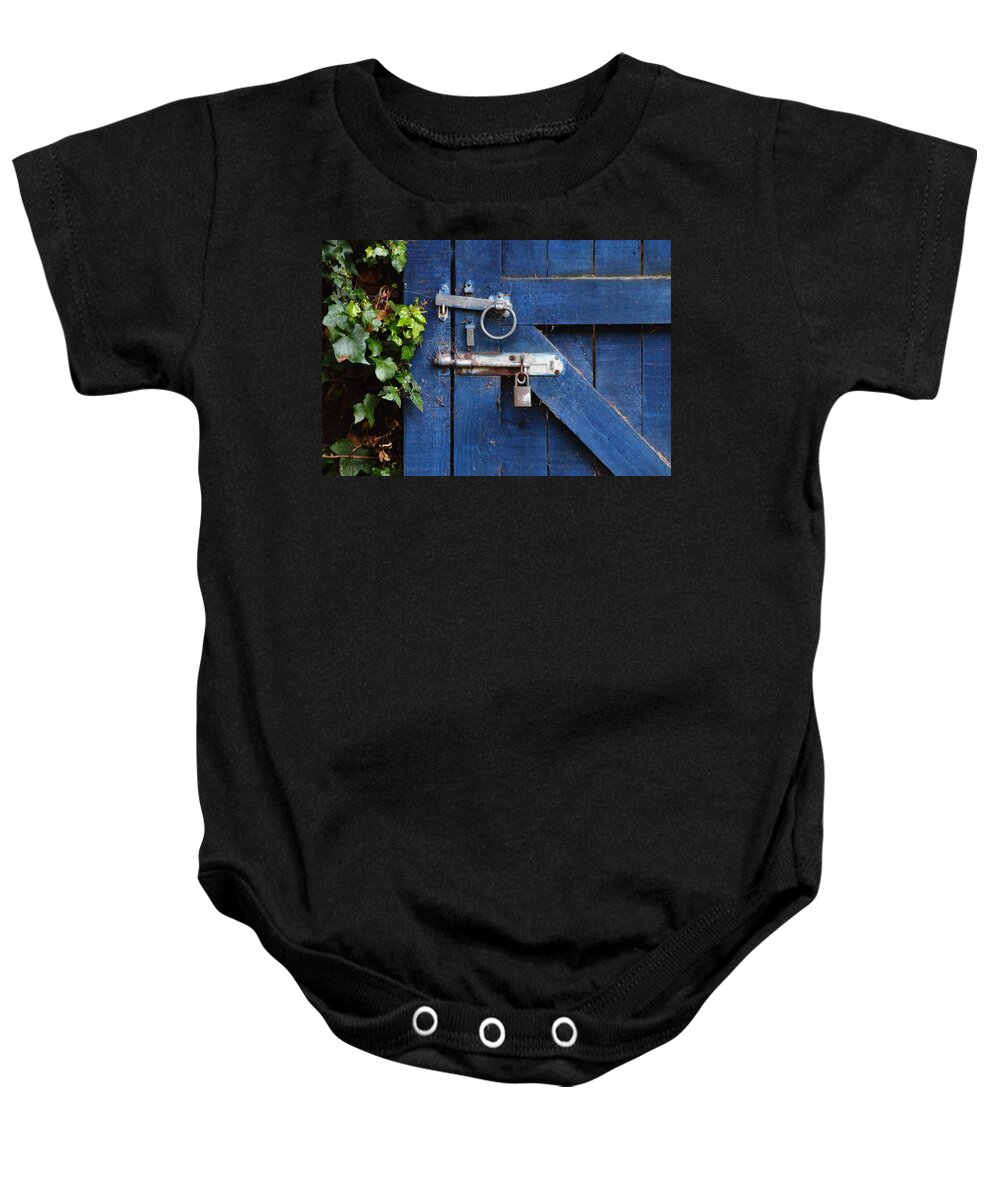 Abstract Blue Door Brass Lock Bolt Rust Wooden Ring Handle Ivy Garden Screws Green Galvanised Fittings Leaves Baby Onesie featuring the photograph Blue Door Lock and Bolt by Jeff Townsend