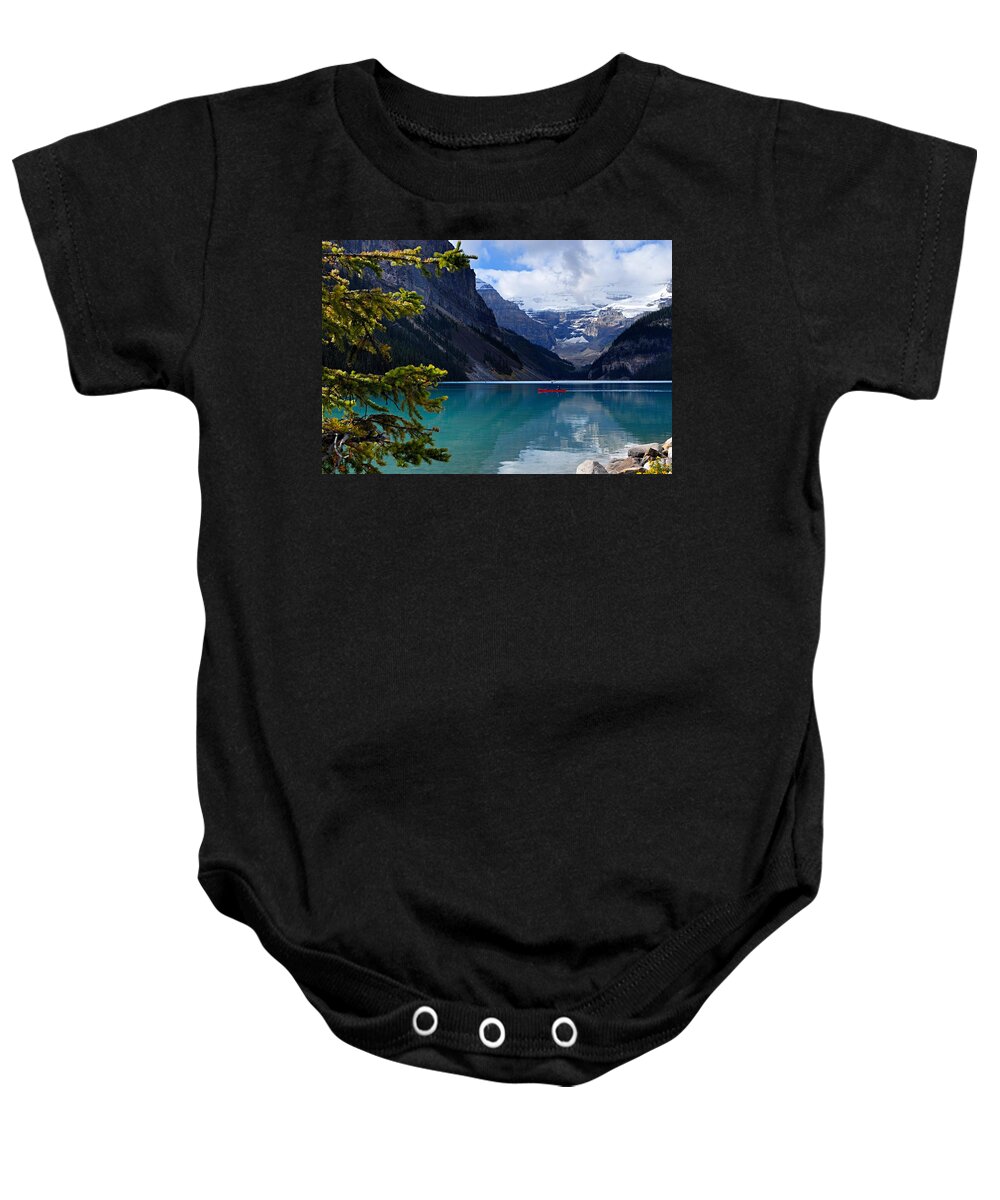 Lake Louise Baby Onesie featuring the photograph Canoe on Lake Louise by Larry Ricker