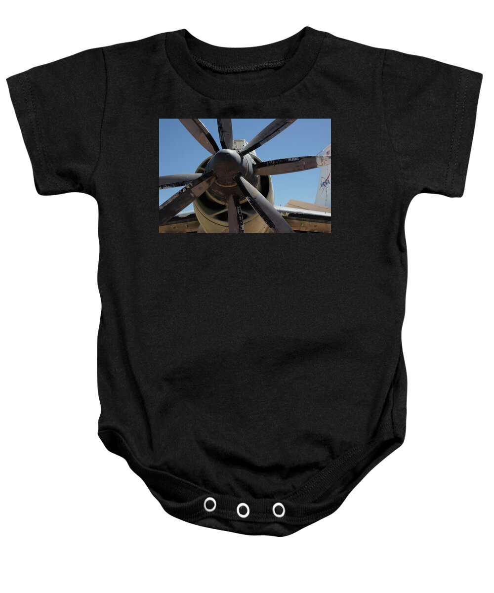 Plane Baby Onesie featuring the photograph Counter Prop #88 by Raymond Magnani
