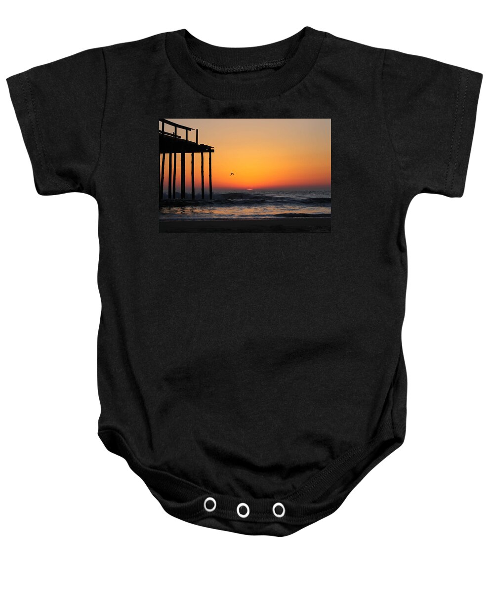 Sun Baby Onesie featuring the photograph Crack of Dawn at the Pier by Robert Banach