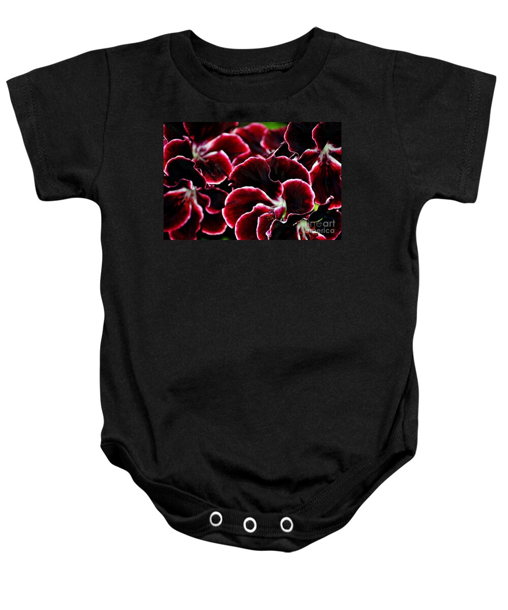 Clay Baby Onesie featuring the photograph Crimson Propellers by Clayton Bruster