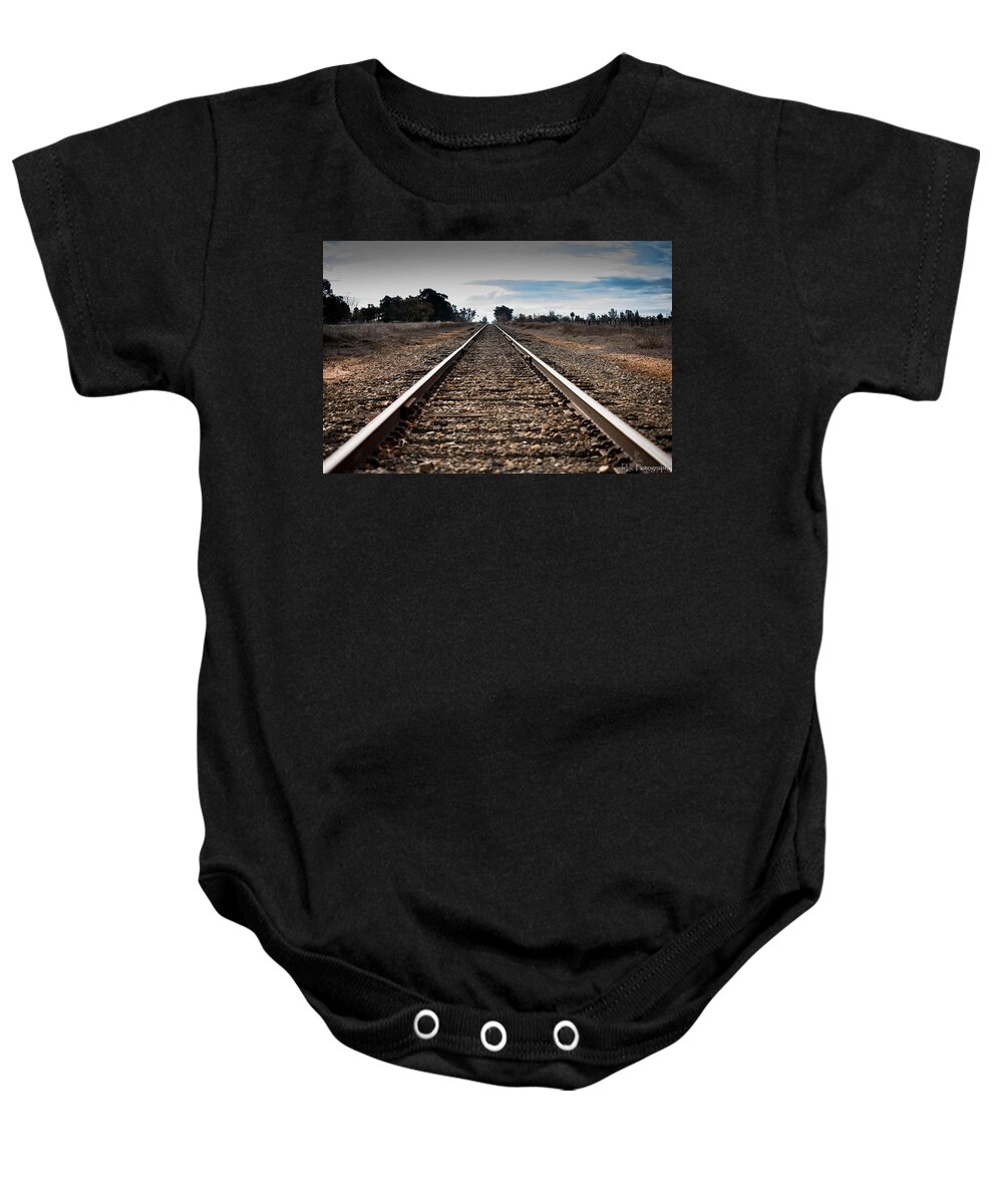 Twin Cities Road Baby Onesie featuring the photograph Down the Track by Wendy Carrington