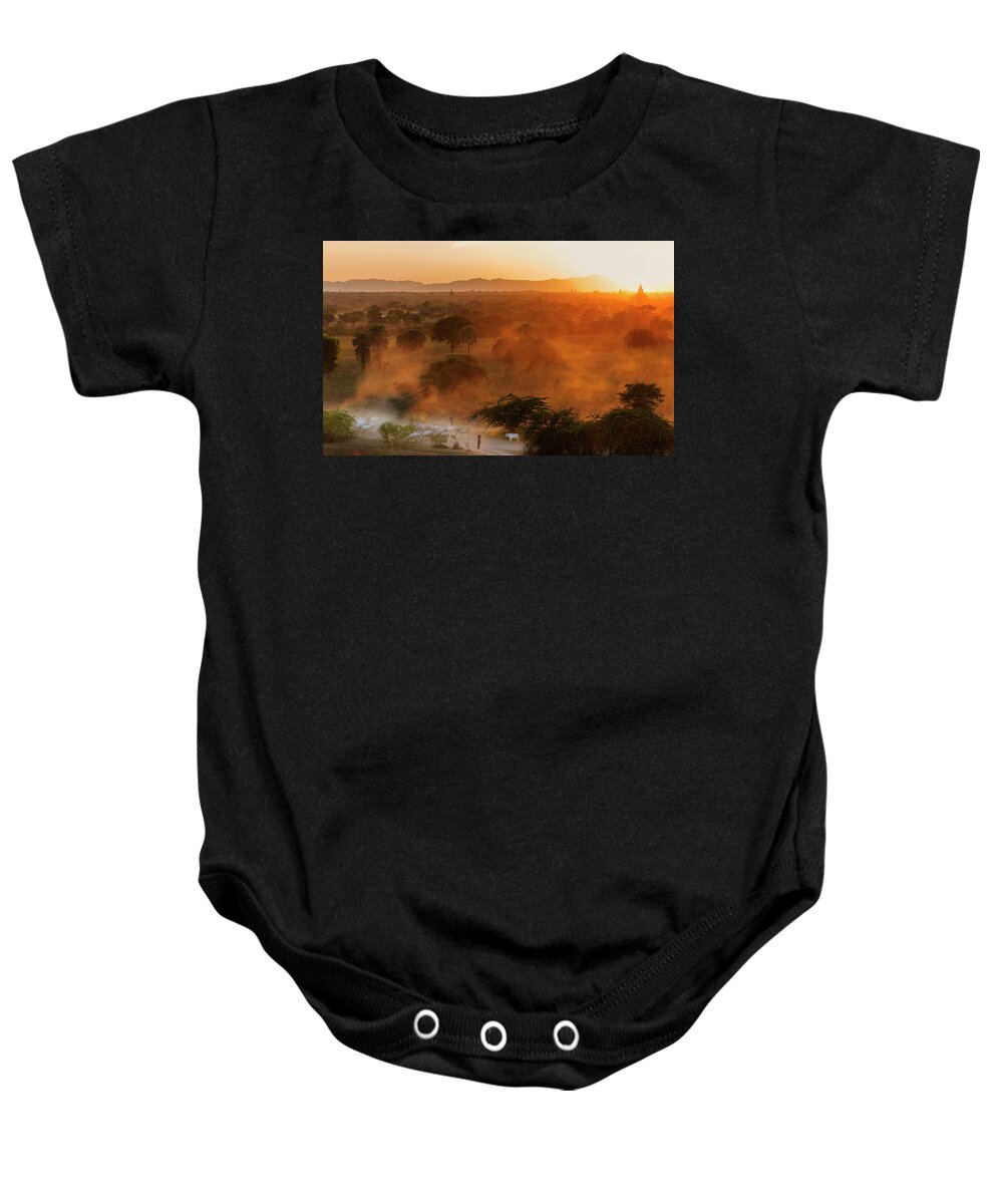 Travel Baby Onesie featuring the photograph Farmer returning to village in the evening by Pradeep Raja Prints