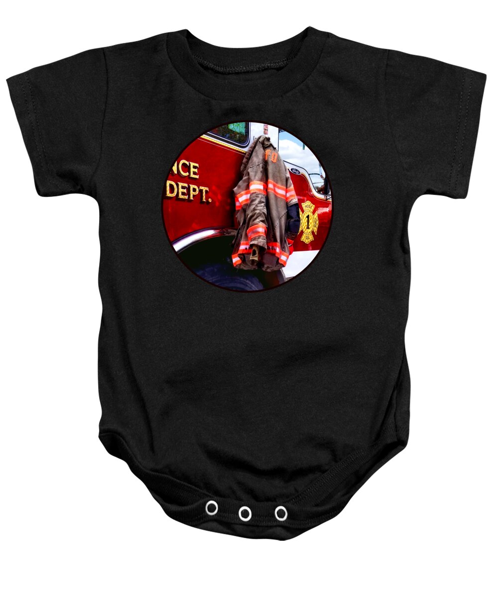 Fireman Baby Onesie featuring the photograph Fireman's Jacket on Fire Truck by Susan Savad
