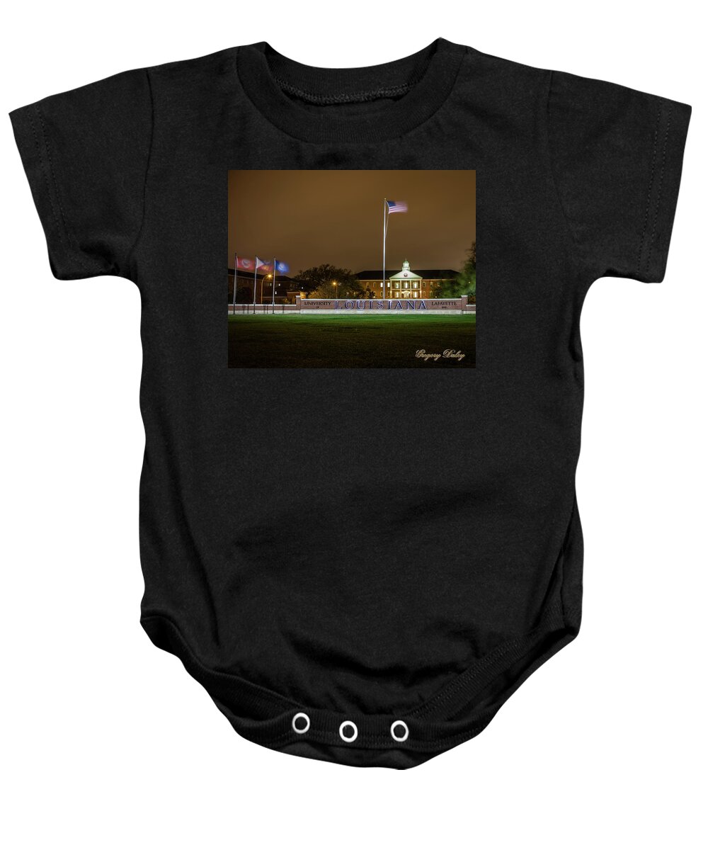 Ul Baby Onesie featuring the photograph Flag at Night in Wind by Gregory Daley MPSA
