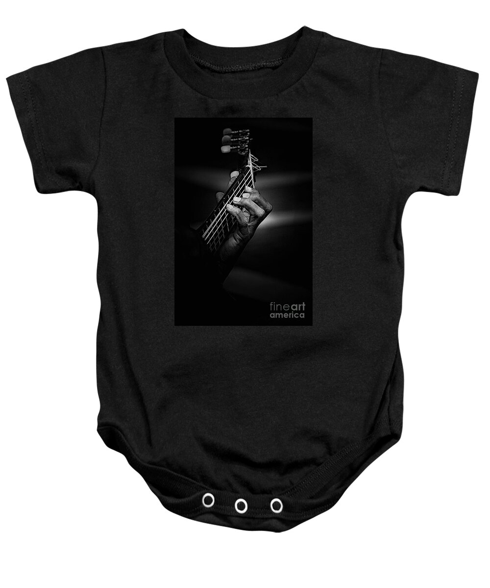 Guitar Baby Onesie featuring the photograph Hand of a guitarist in monochrome by Sheila Smart Fine Art Photography