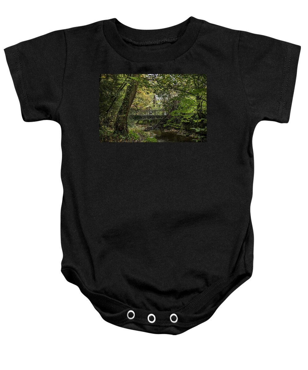 Season Baby Onesie featuring the photograph Hidden Bridge at Offas Dyke by Spikey Mouse Photography